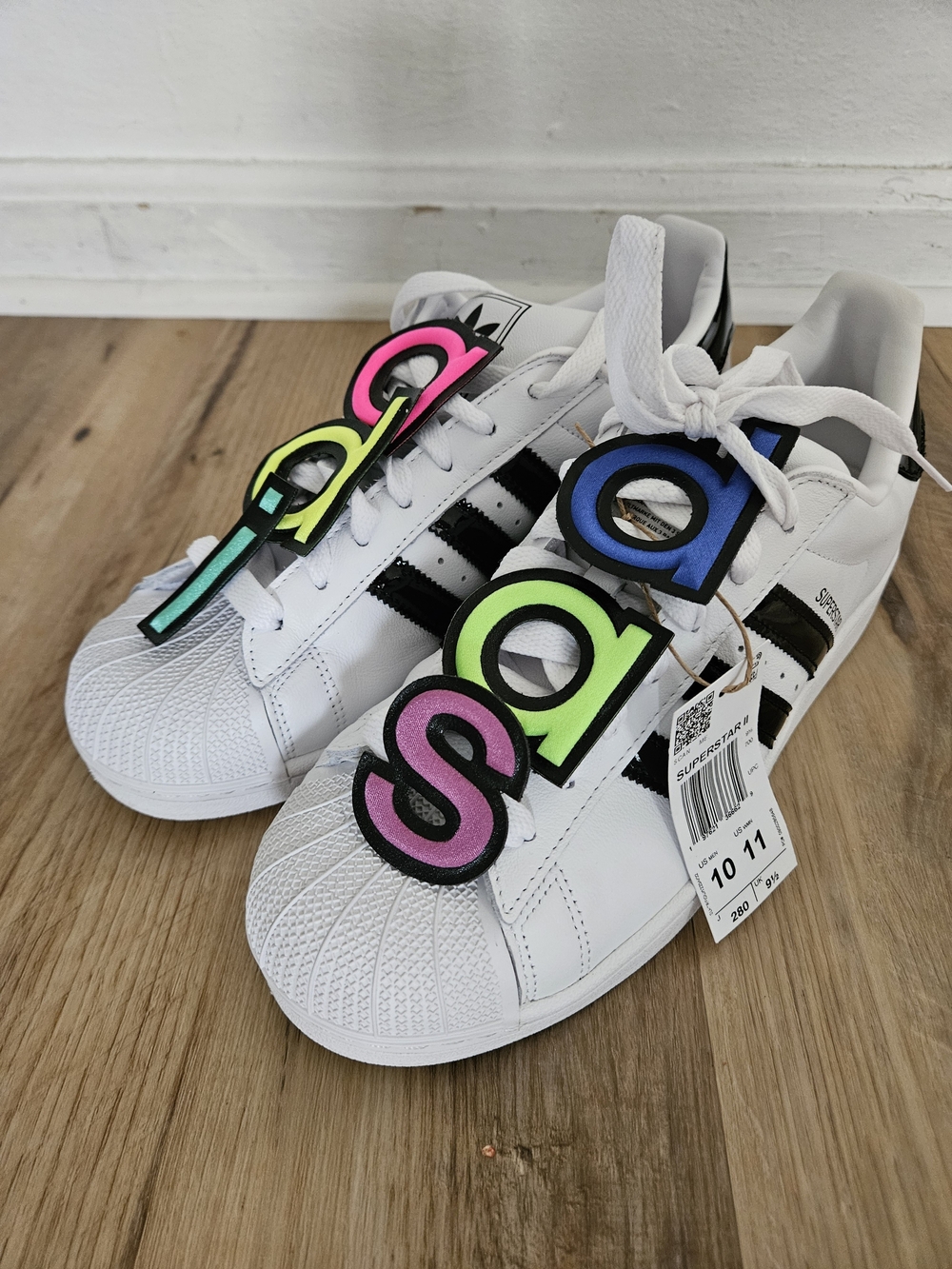 Adidas Jeremy ScotJeremy ScotWhite and Black Sneakers with Neon Logo Charms
